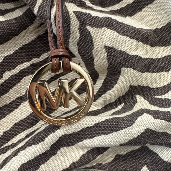 Like new, gently used Michael Kors canvas zebra print tote bag. - Picture 2 of 6